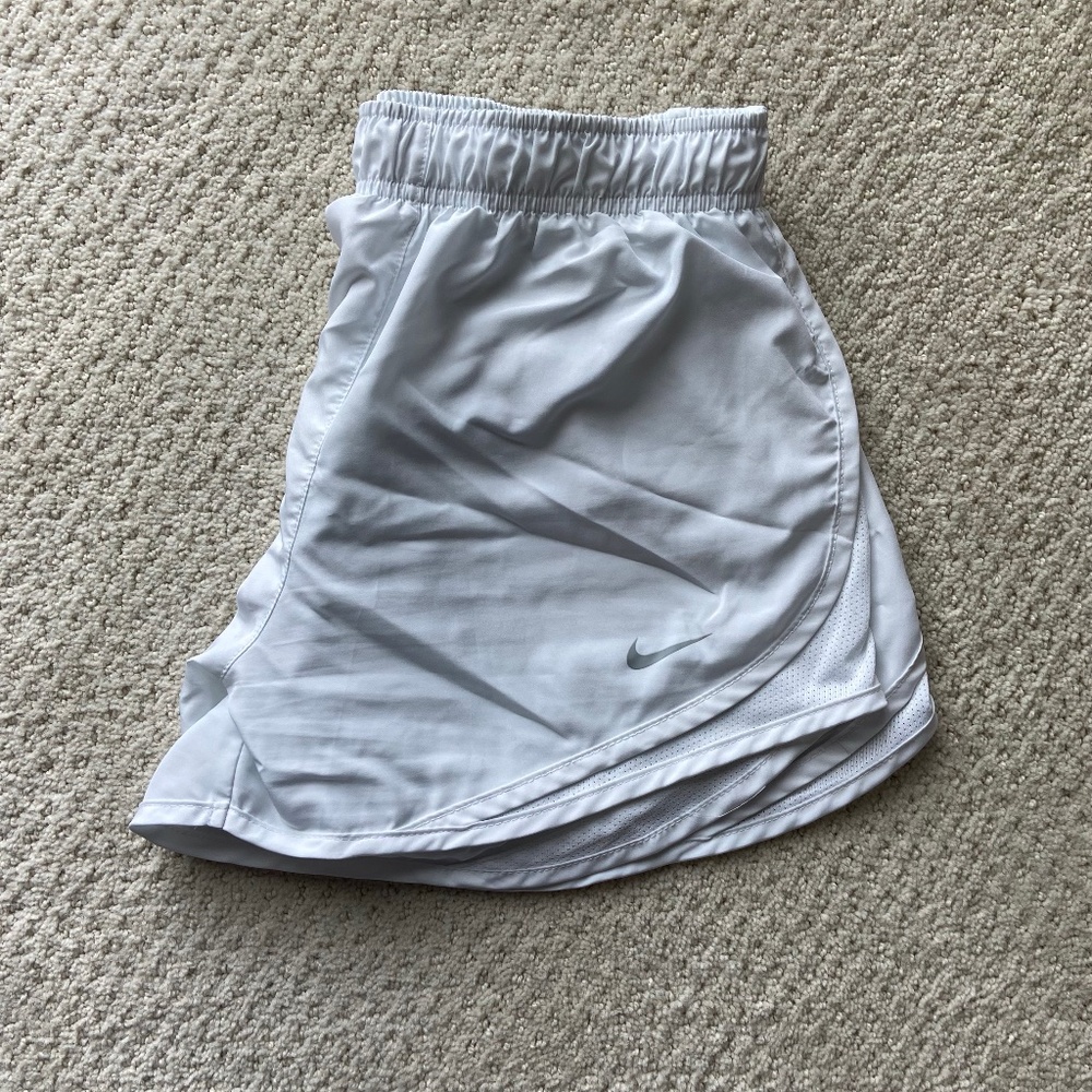White Nike shorts